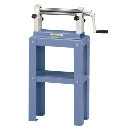 Calandra Bernardo RM 305 con rulli in acciaio da 305 mm, rullo posteriore inclinato e scanalature per la produzione di tubi e coni.