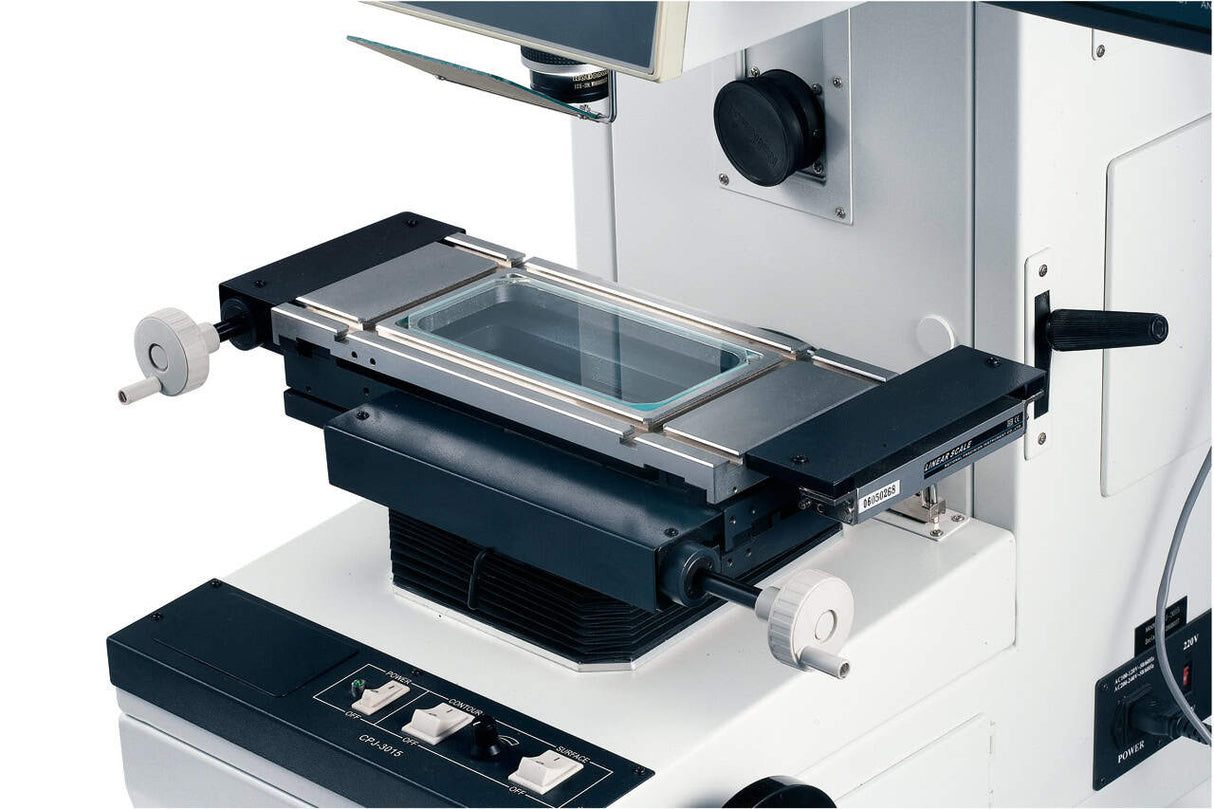 Measurement and profile projector 