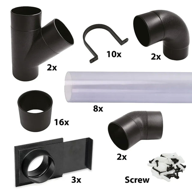 Vista del set completo montato su parete: tubi trasparenti con raccordi, curve e cursori che collegano le macchine per la lavorazione del legno a un sistema di aspirazione centralizzato.